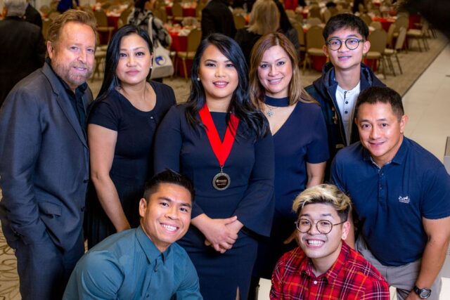 photo of graduates and family