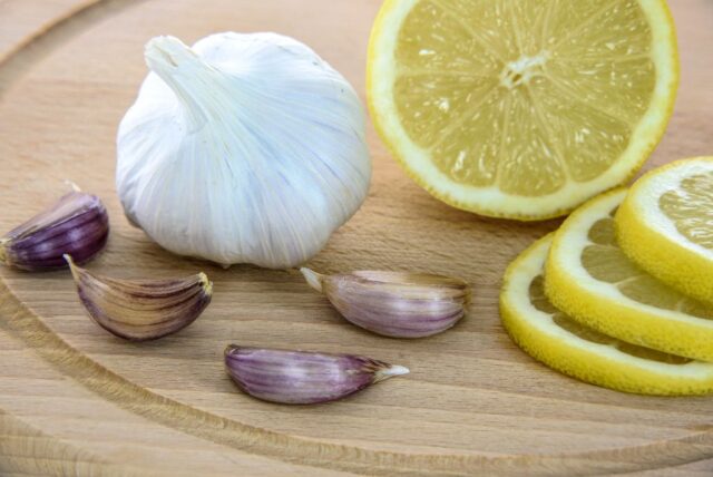 Image of garlic and lemon to indicate healing properties.